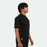 a fit man wearing matching set black ,t-shirt and short 