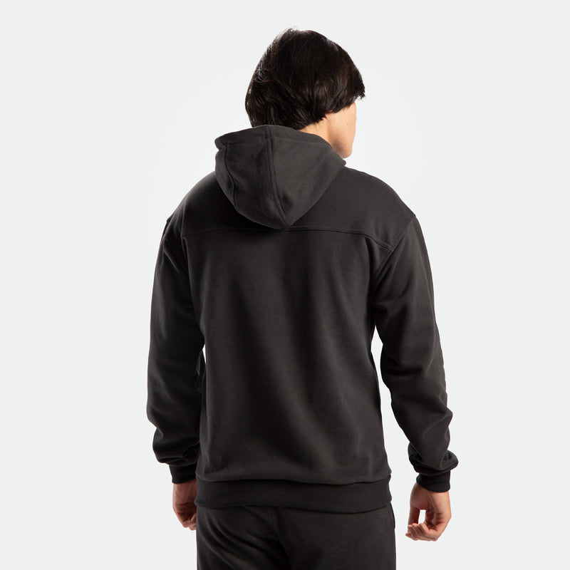 a back view for fit man wearing hoodie pirate black with pants 