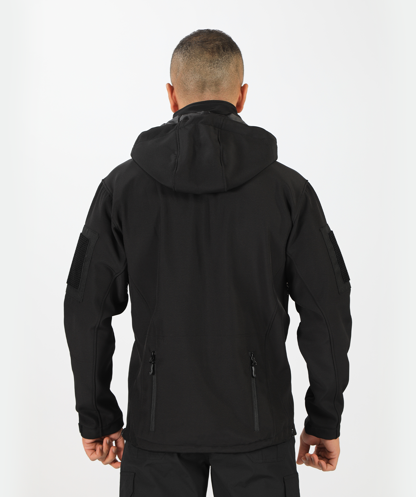 a back view or fit man wearing a polo jacket black with two zipper ,plus he wearing pants black 