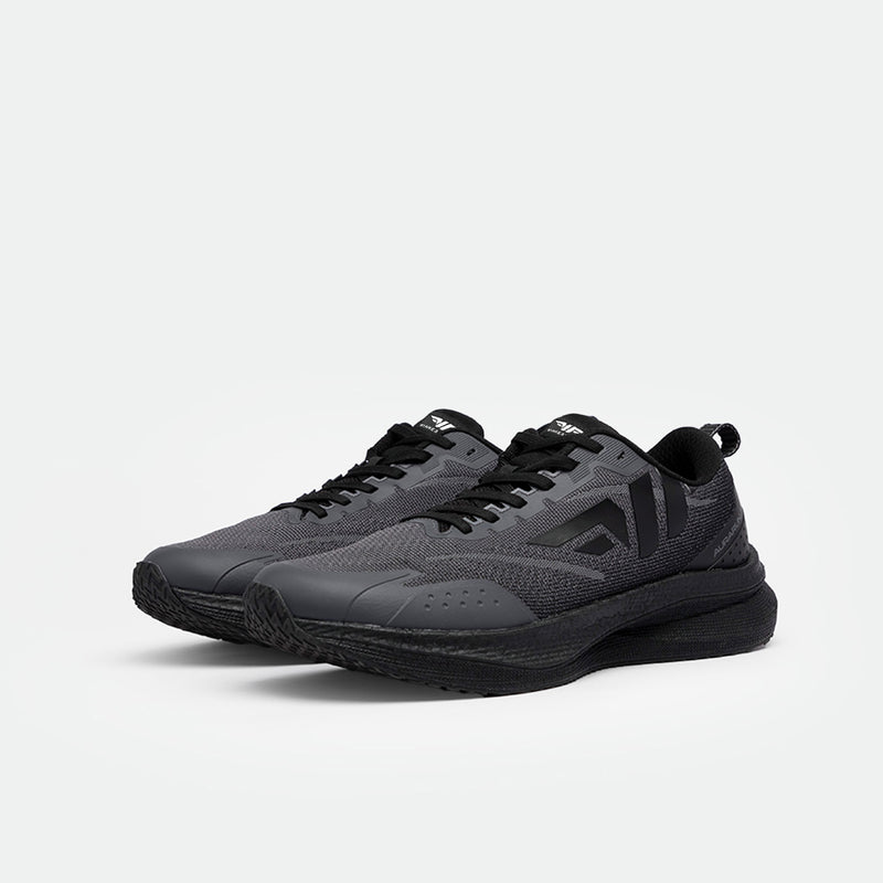 Sleek black running shoes with gray mesh and black laces, angled slightly to the left on a plain white background, conveying a modern, sporty vibe.