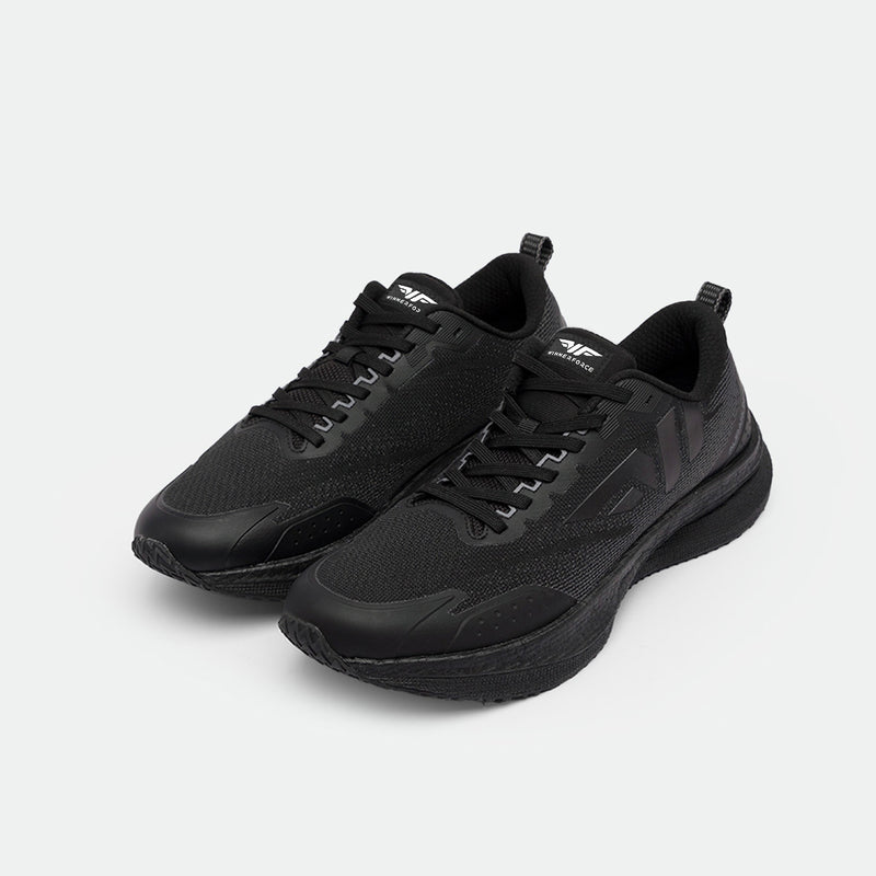 A pair of sleek black athletic sneakers with a mesh design and textured soles, positioned on a light gray background. The style exudes modern sportswear.