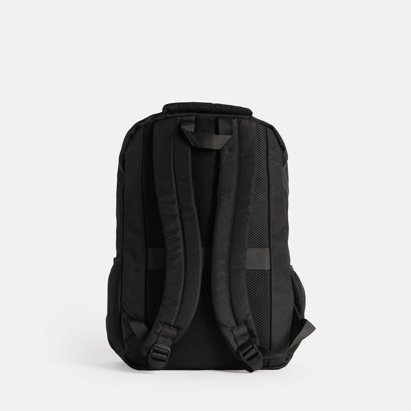 Back view of a black backpack featuring two adjustable padded shoulder straps, a padded back panel with breathable mesh, and a sturdy top handle