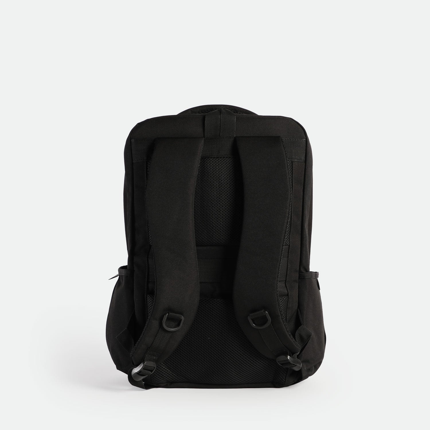 Back view of a black backpack featuring two adjustable padded shoulder straps, a padded back panel with breathable mesh, and a sturdy top handle
