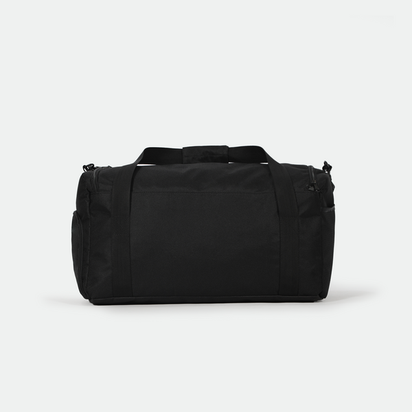 A black duffel bag with sturdy handles and a textured surface is centered against a plain white background, conveying simplicity and functionality.