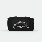 A sleek black duffel bag with "WINNERFORCE" in bold white letters and a stylized wing logo. The design is modern and sporty, conveying strength.