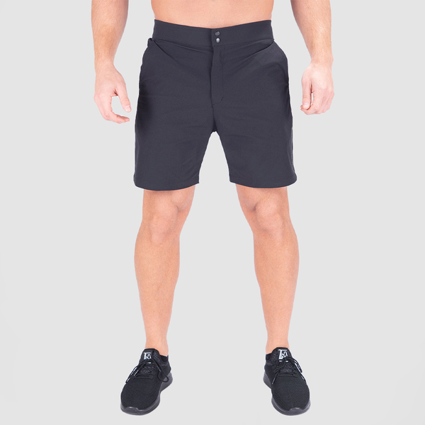 a fit man wearing  short black with shoes 