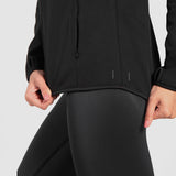 close up view for fit woman wearing jacket and legging black 