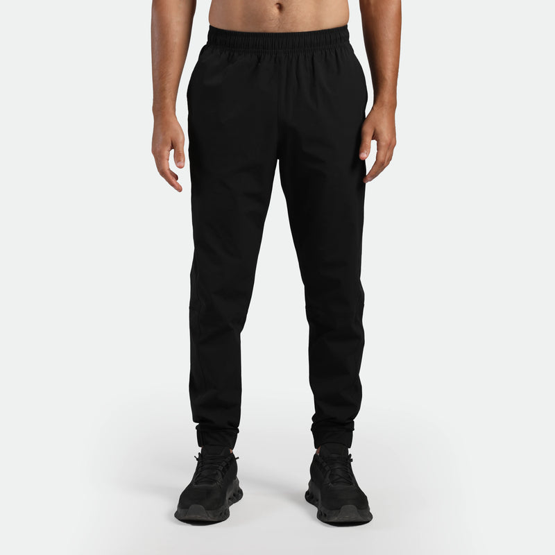 Person wearing black jogger pants 