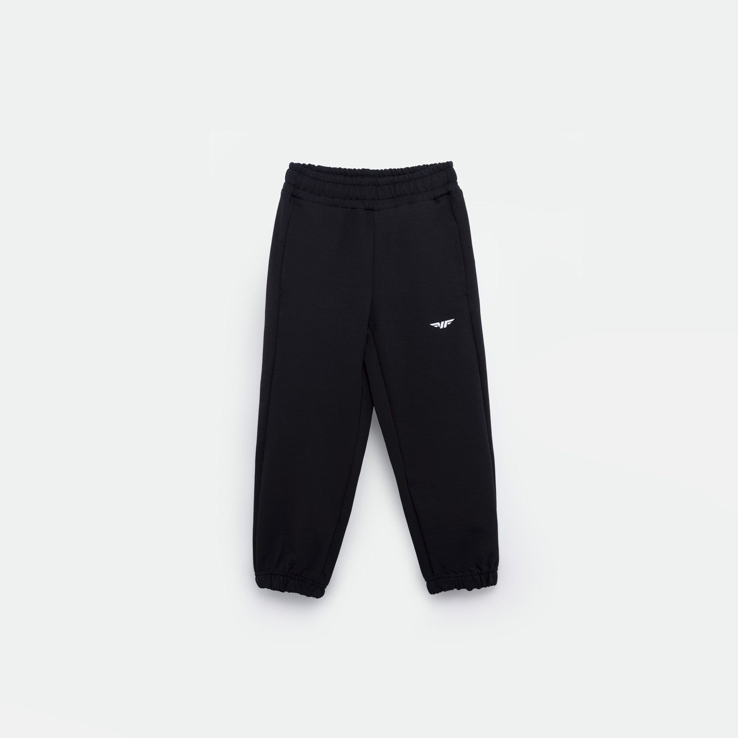 black JOGGER PANT FOR GIRL with an elastic waistband and cuffs, featuring a small white logo (WINNER FORCE) on the left thigh