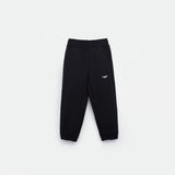 black JOGGER PANT FOR GIRL with an elastic waistband and cuffs, featuring a small white logo (WINNER FORCE) on the left thigh