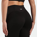 Black leggings with a brand logo on a white background