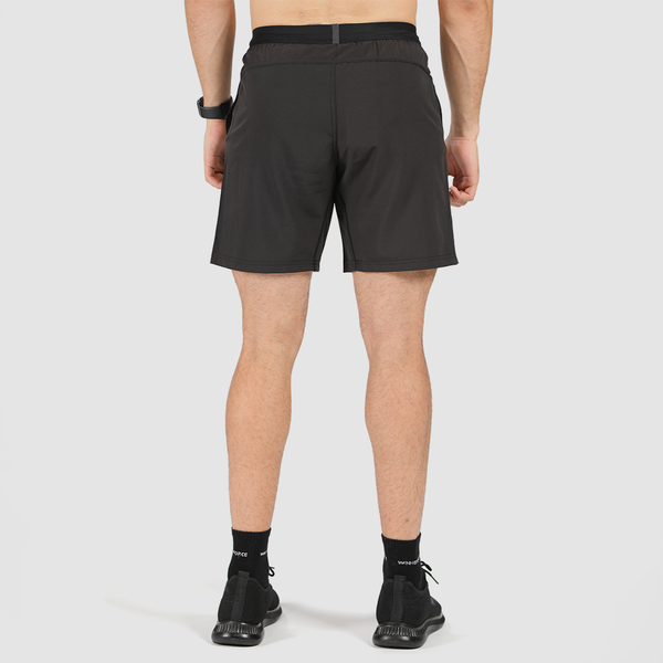 a back view for fit man wearing short black with shoes and socks black 