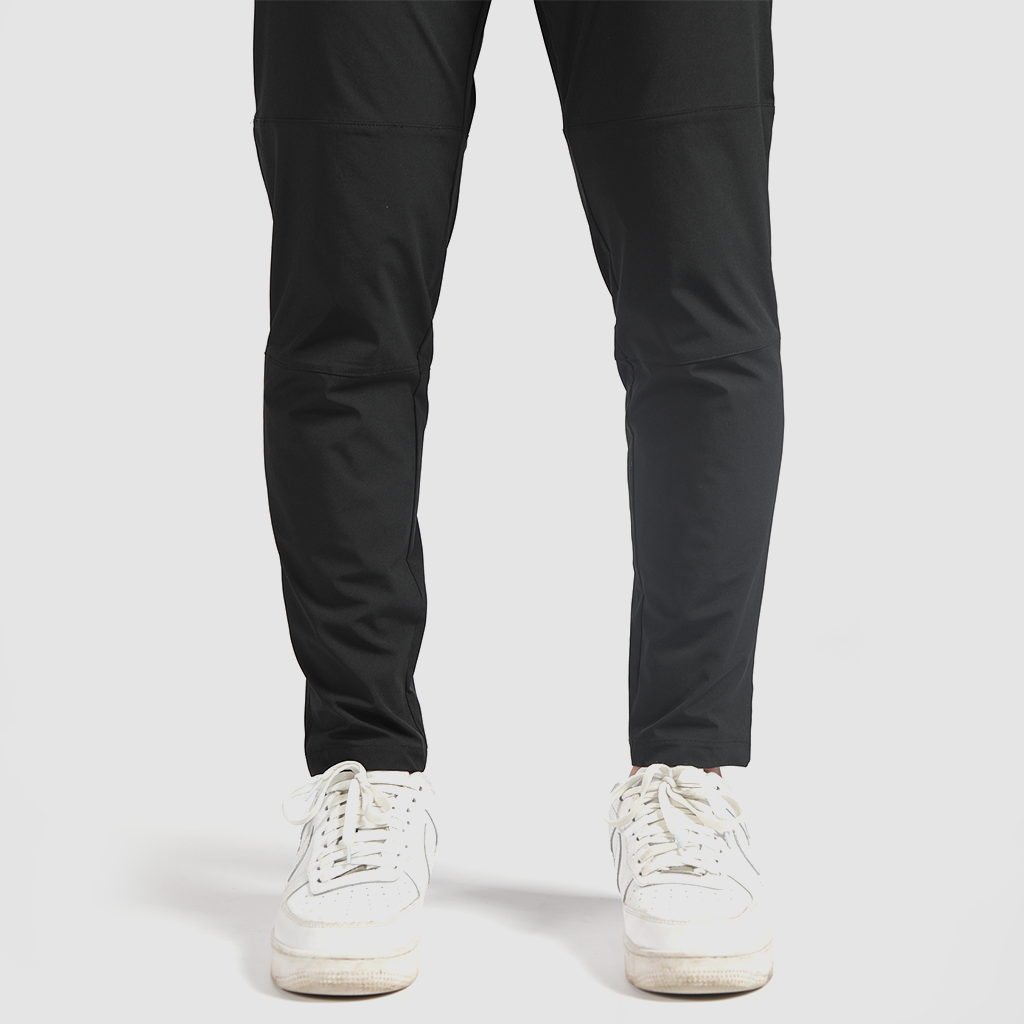 a fit man wearing pants back 