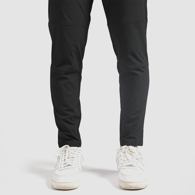 a fit man wearing pants back 