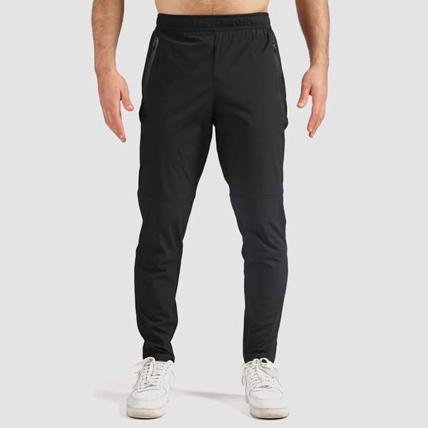 a fit man wearing pants black ,plus the shoes white 