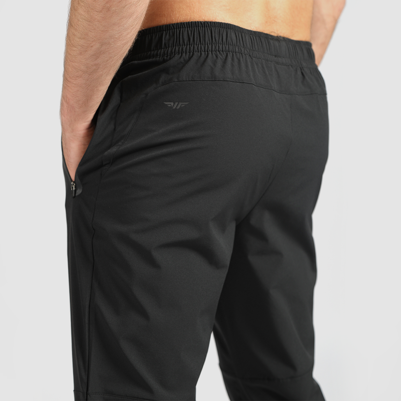 close up view for fit man wearing pants black 