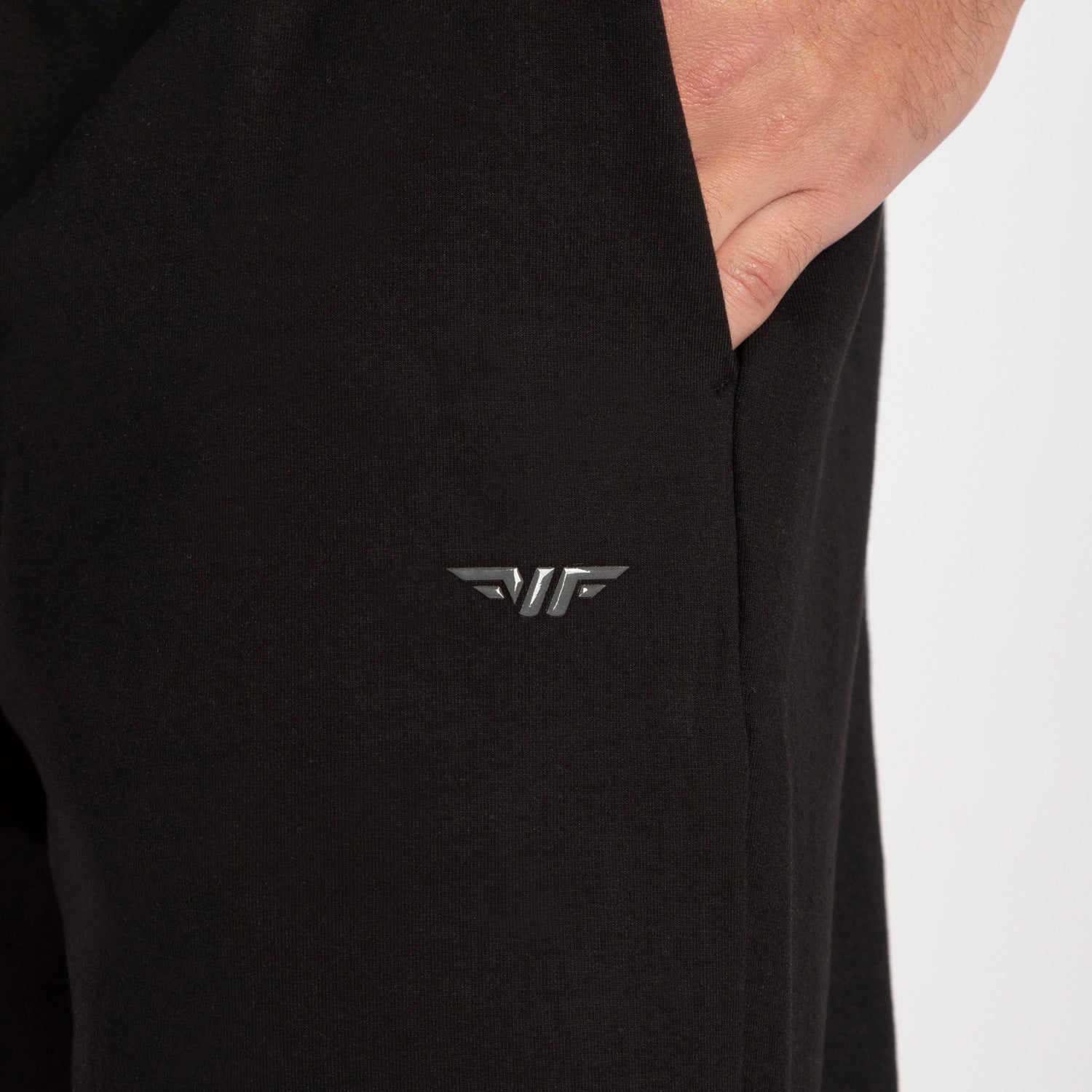 close up view for pocket of pants black with logo 