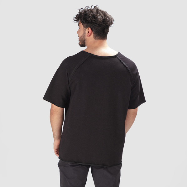 a back view for fit man wearing t-shirt black with pants black 
