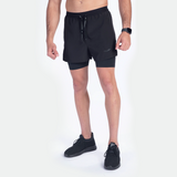 a fit man wearing short black 2 in 1 with shoes black 