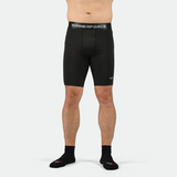 a fit man wearing short black with socks black 