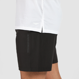 close up view for man wearing t-shirt white with short black 