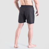 a back view for man wearing short black 