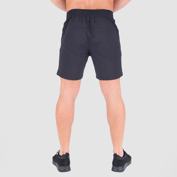 a back view for man wearing short black with shoes black  