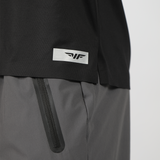 close up view of  logo for t-shirt black with zipper of pants grey 