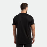 a back view for man wearing t-shirt  black with pants 