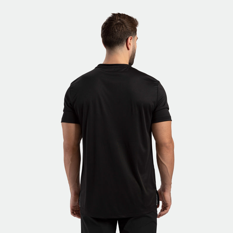a back view for man wearing t-shirt  black with pants 