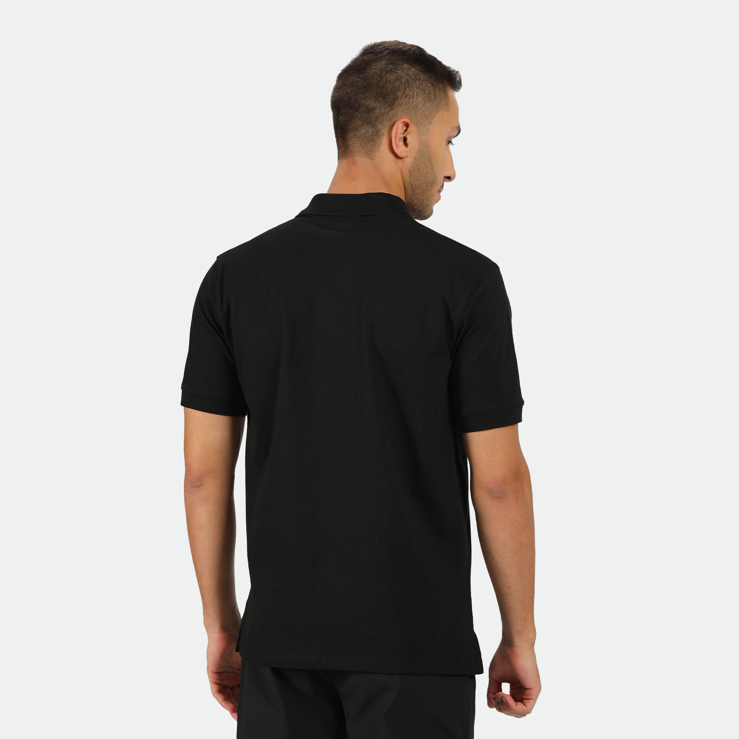 aback view for fit man wearing t-shirt black with pants black 