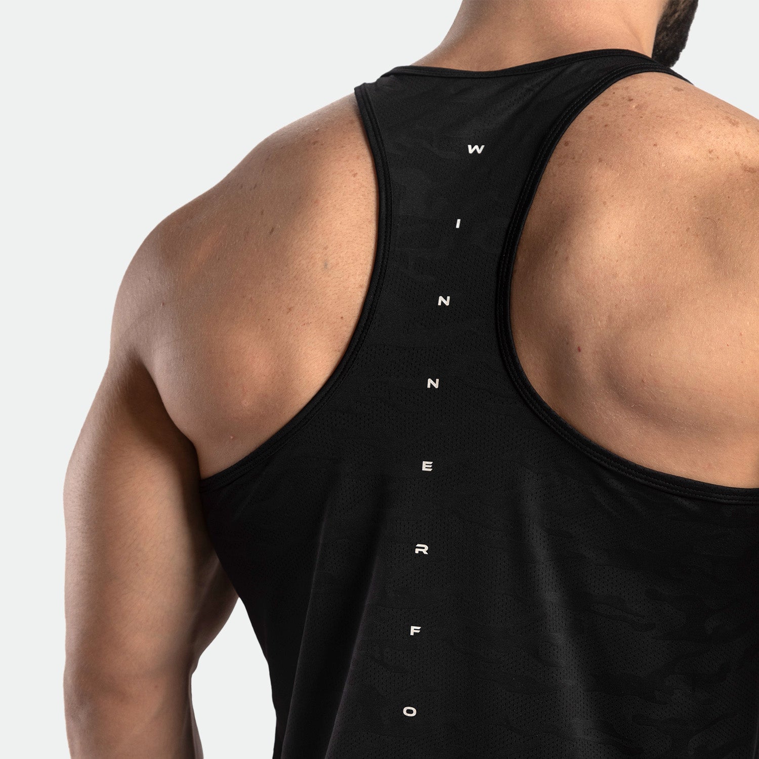 close up view for man wearing t-shirt tank black with logo 