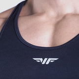 close up view for fit man wearing tank black with logo in half 