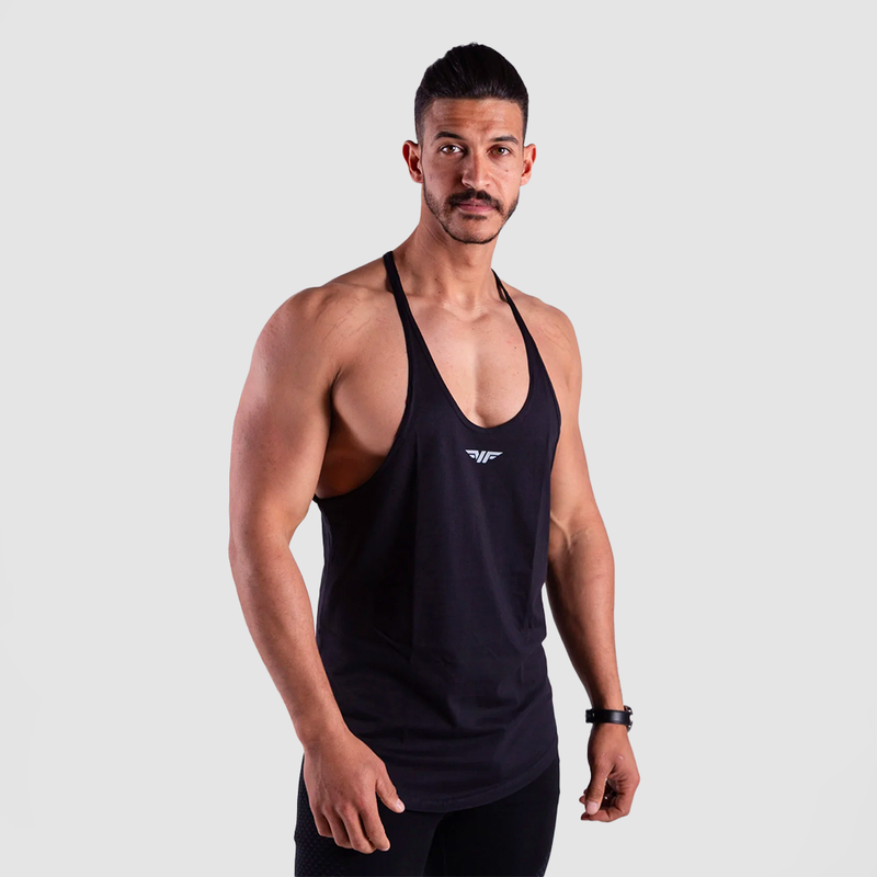 A man wearing a black slim-fit gym tank top with a scooped neckline and a racerback design.