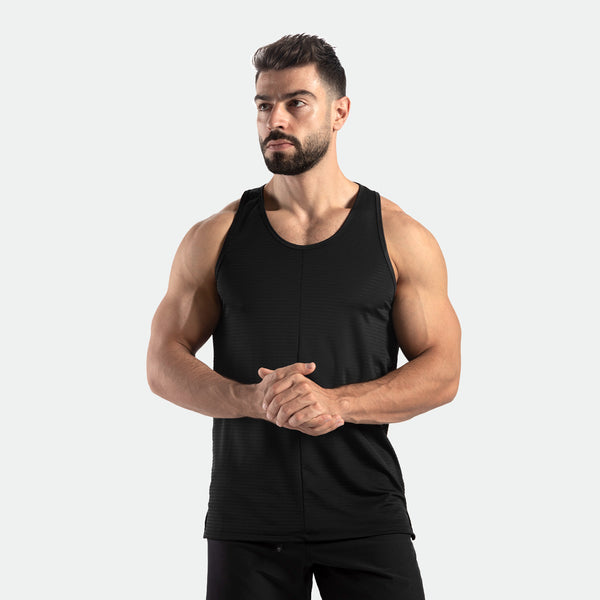 a fit man wearing t-shirt black with pants black 