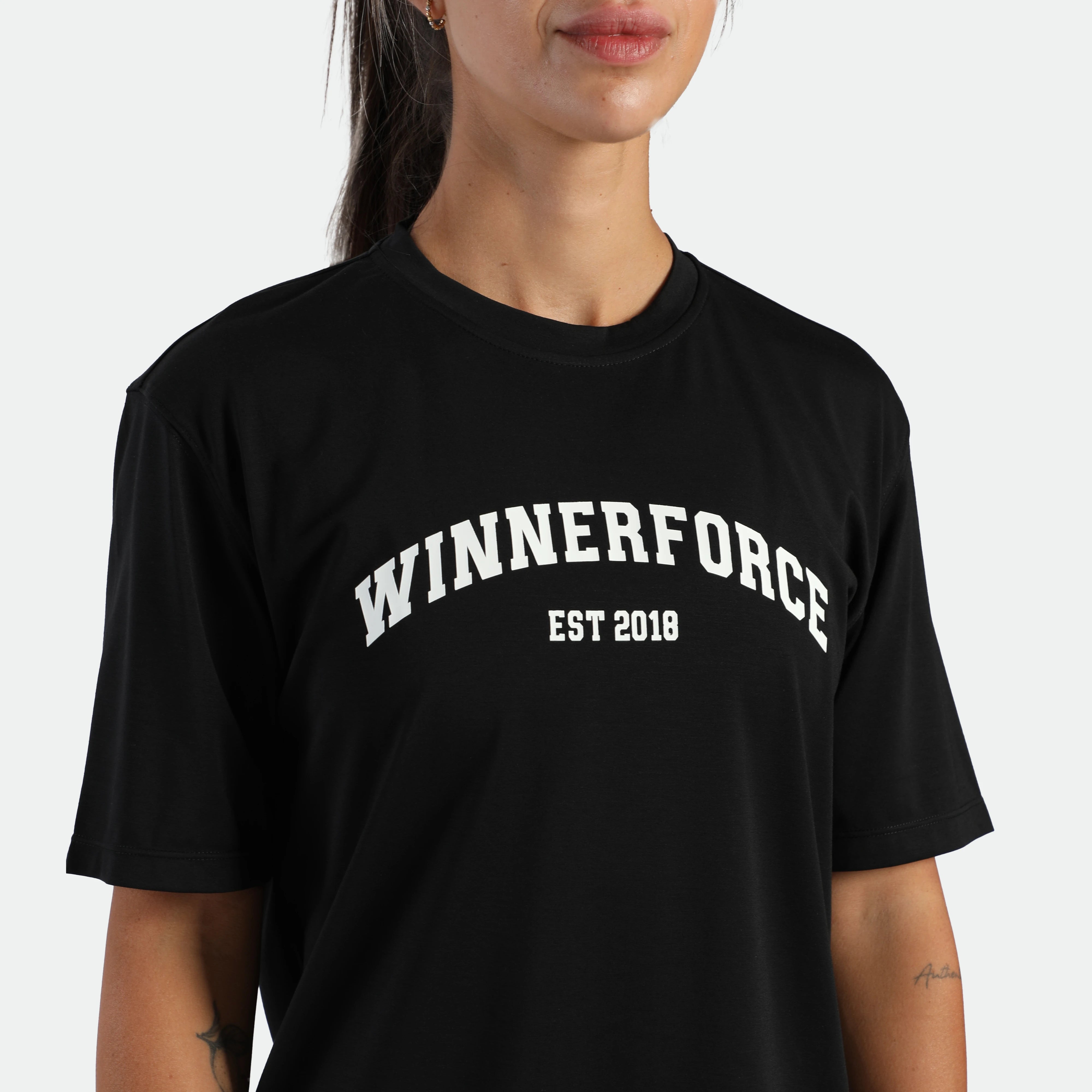 close up view for it woman wearing t-shirt black with logo