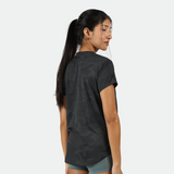 a back view for fit woman wearing t-shirt camo black with short green 