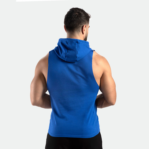 a back view for fit man wearing Nautical blue  half hoodie with pants black 