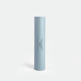 A light blue yoga mat, rolled up, stands vertically against a plain white background. The mat has "WINNERFORCE" printed in a subtle, elegant font.