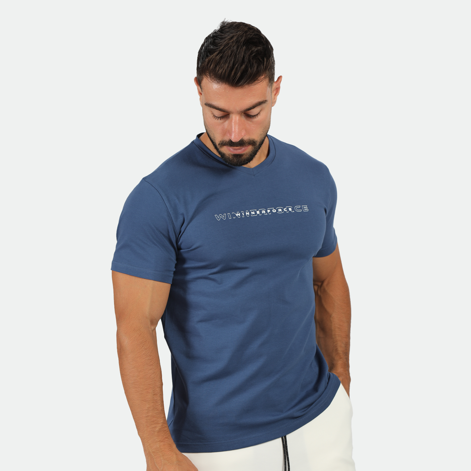 a fit man wearing t-shirt blue opal with logo and short white 