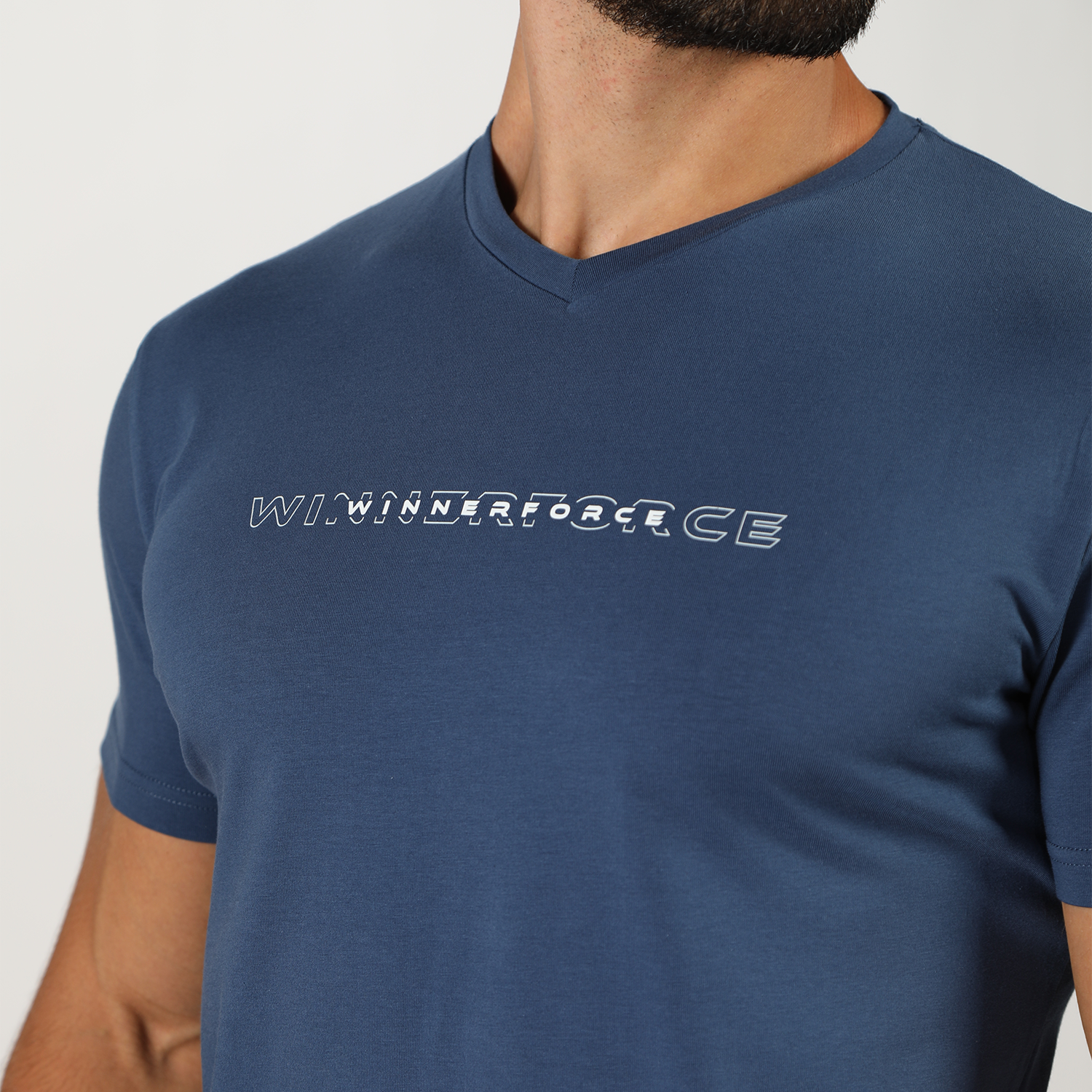 close up view for fit man wearing t-shirt white with logo 