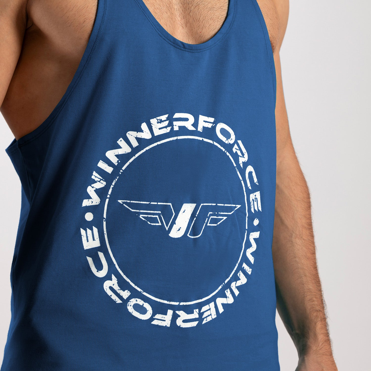 close up view for fit man wearing tank blue 