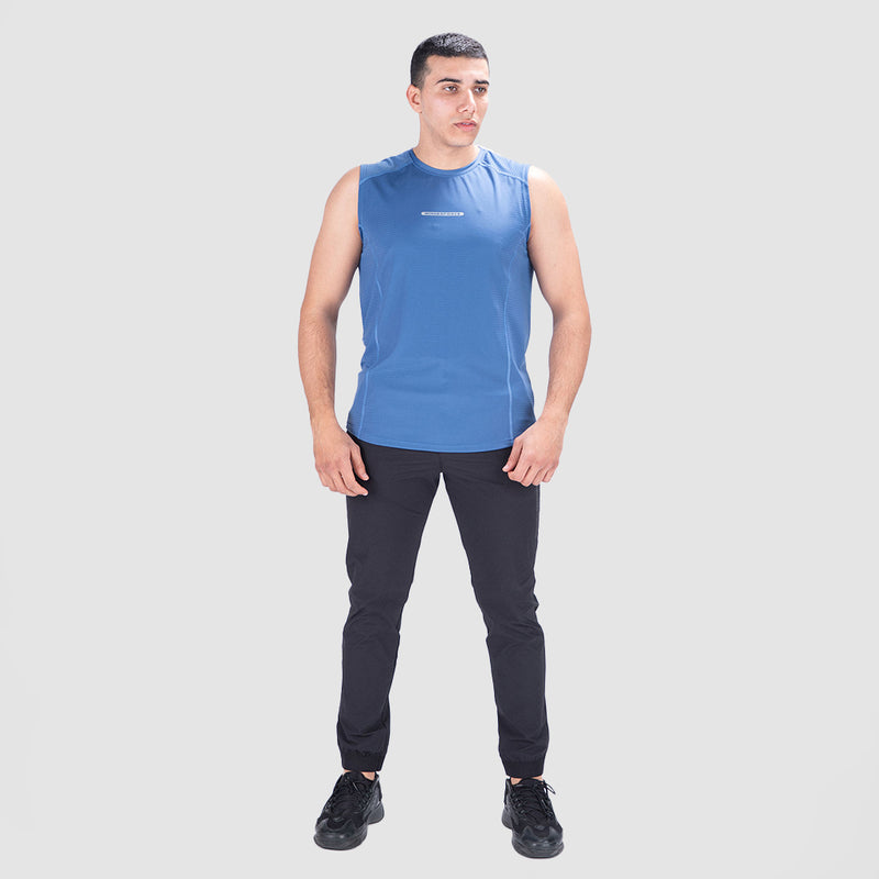 a fit man wearing  t-shirt blue  with pants black ,plus the shoes 