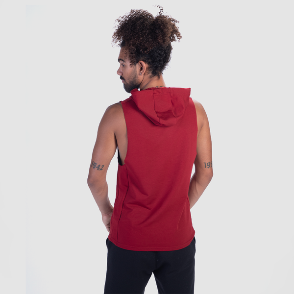 a back view for fit man wearing half hoodie burgundies red with pants black 