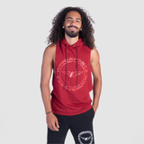 a fit man wearing half hoodie 
 burgundy red with logo and pants black with logo 