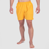 a fit man wearing canary yellow 