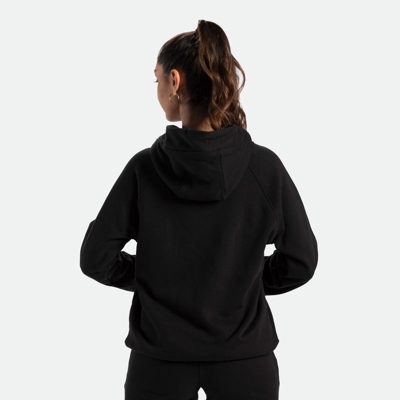 a back  view for fit woman wearing hoodie  black with pants  