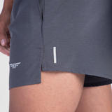 close up view view for fit man wearing short grey with logo 