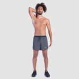 a fit man wearing short grey with shoes black 