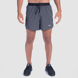 a fit man wearing short charcoal grey with shoes black  